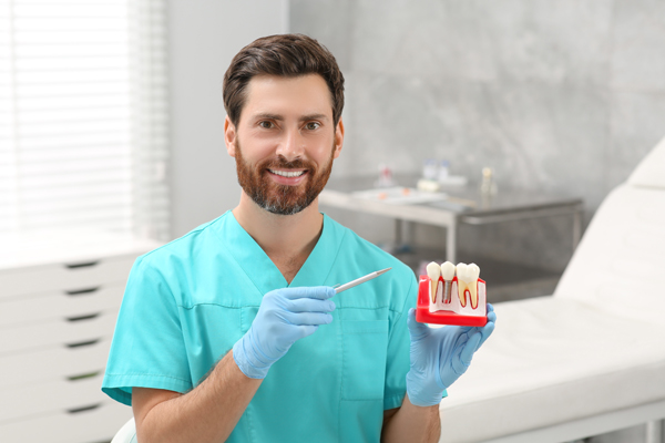 How An Implant Dentist Places An Artificial Tooth Root
